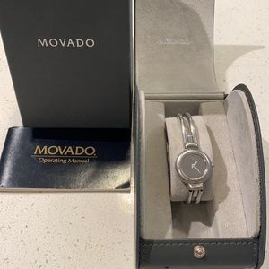 Woman’s Movado mirror face watch with diamond.